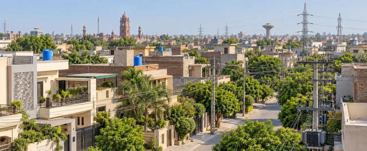 AI-generated illustrative residential scene inspired by Faisalabad, with rooftops and electricity infrastructure